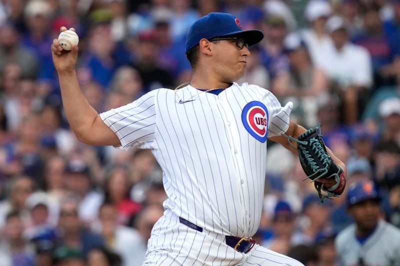 Chicago Cubs starting pitcher Javier Assad throws against the New York Mets during the first inning of a baseball game in Chicago, Sunday, June 23, 2024. (AP Photo/Nam Y. Huh)