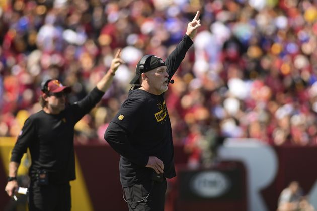 Washington Commmanders head coach Dan Quinn reacts to a play during the first half of an NFL football game against the New York Giants in Landover, Md., Sunday, Sept. 15, 2024. (AP Photo/Steve Ruark)