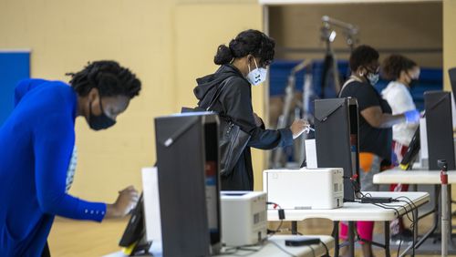 Smyrna residents cast their votes at the Smyrna Community Center during the Georgia primary elections, Tuesday, June 9, 2020. (ALYSSA POINTER / ALYSSA.POINTER@AJC.COM)