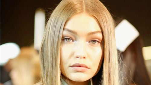 MILAN, ITALY - SEPTEMBER 23: Gigi Hadid seen backstage ahead of the Versace show during Milan Fashion Week Spring/Summer 2017 on September 23, 2016 in Milan, Italy. (Photo by Tristan Fewings/Getty Images)