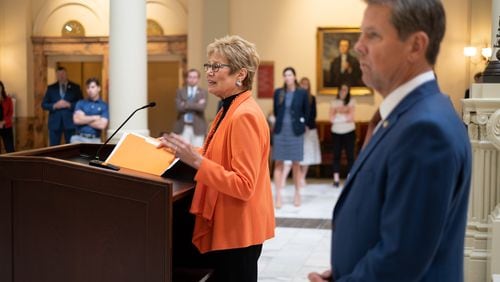 Gov. Brian Kemp said Monday that he had spoken with Georgia Public Health Commissioner Kathleen Toomey that morning about the omicron threat and "we’ll continue to monitor." The governor is seen here with Dr. Toomey giving an update about COVID in Georgia at the State Capitol in September. (Ben Gray for the Atlanta Journal-Constitution)