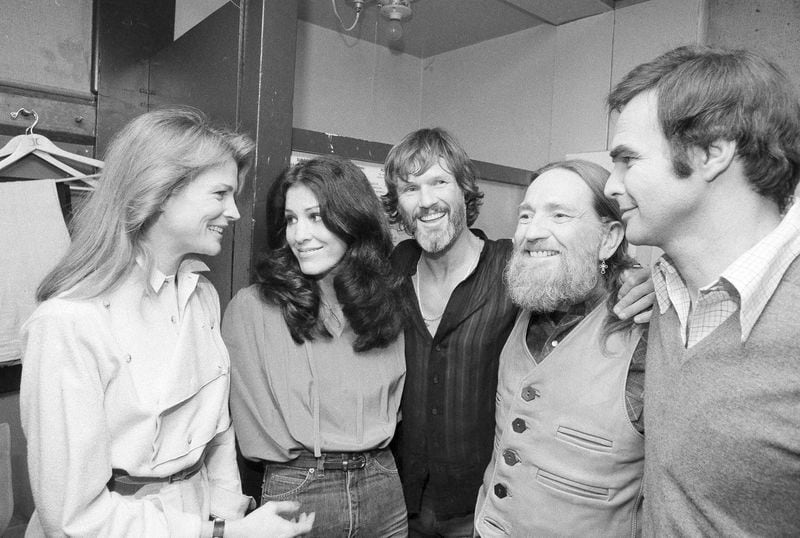 FILE - Actress Candice Bergen, from left, singer Rita Coolidge, singer/songwriter Kris Kristofferson, country singer Willie Nelson, and actor Burt Reynolds are seen backstage at New York's Bottom Line after Coolidge and Kristofferson's opening night, Jan. 4, 1979. Kristofferson, a Rhodes scholar who became a superstar songwriter, singer and actor, died Saturday, Sept. 28, 2024. (AP Photo/Richard Drew, File)