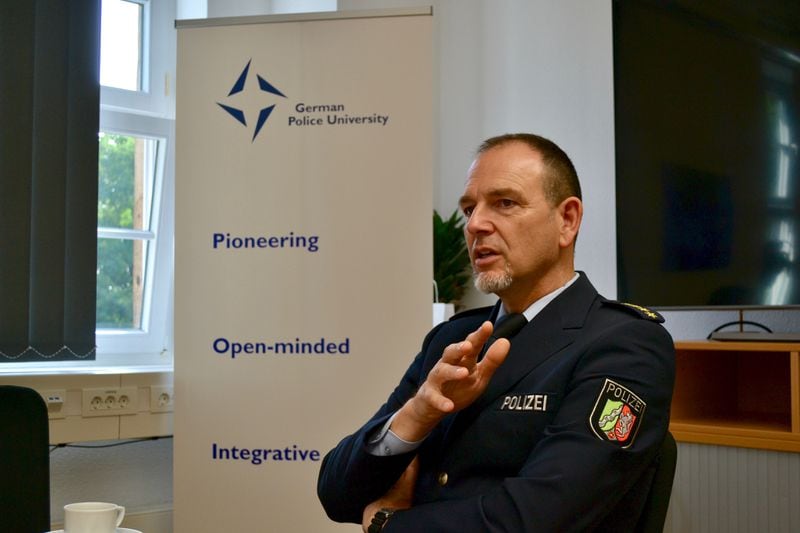 Uwe Marquardt, Deputy Police Commissioner in North Rhine-Westphalia, and Vice-President of the German Police University, discussed police training to a small group of Atlanta officers visiting GPU. (Courtesy of Katja Ridderbusch)