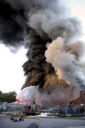 Fulton warehouse fire generates massive smoke plume