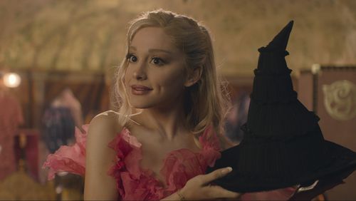 This image released by Universal Pictures shows Ariana Granda as Glinda in the film "Wicked." (Universal Pictures via AP)