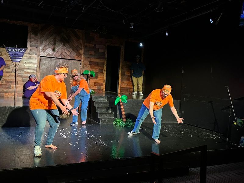 Whole World Theatre's "Improvivor" show featured Tanya Wagner, Jake Riley and John Mihalik as part of the Gen X crew building a roller coaster during an improv game. RODNEY HO/rho@ajc.com