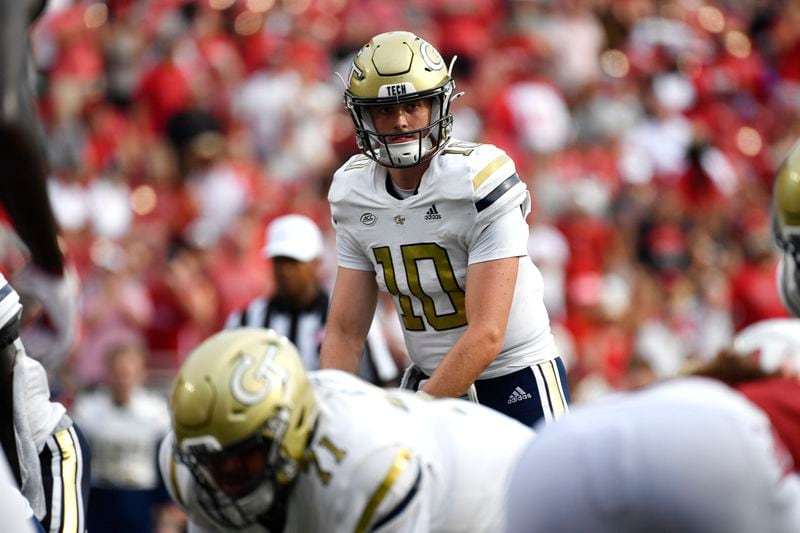 Georgia Tech quarterback Haynes King (10) looks out over the Louisville defensive line before the snap during the first half of an NCAA college football game in Louisville, Ky., Saturday, Sept. 21, 2024. Louisville won 31-19. (AP Photo/Timothy D. Easley)