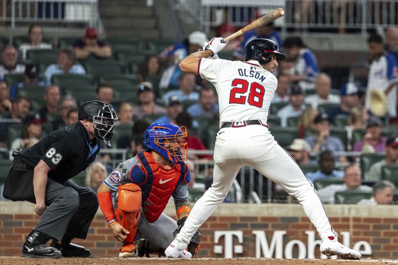 Atlanta Braves' Matt Olson (28) watches a pitch in the fifth inning of a baseball game against the New York Mets, Tuesday, Sept. 24, 2024, in Atlanta. (AP Photo/Jason Allen)