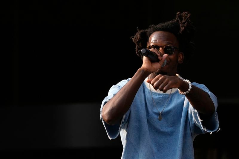 JSWISS performs in the Harlem neighborhood of New York, Thursday, Aug. 15, 2024. (AP Photo/Pamela Smith)