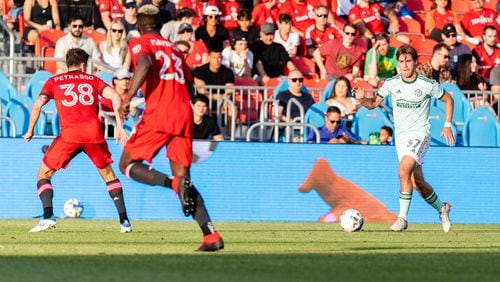 Atlanta United defender Aidan Mcfadden dribbles the ball during the first half of the match against Toronto FC at BMO Field in Toronto, Canada on Saturday June 25, 2022. (Photo by Dakota Williams/Atlanta United)