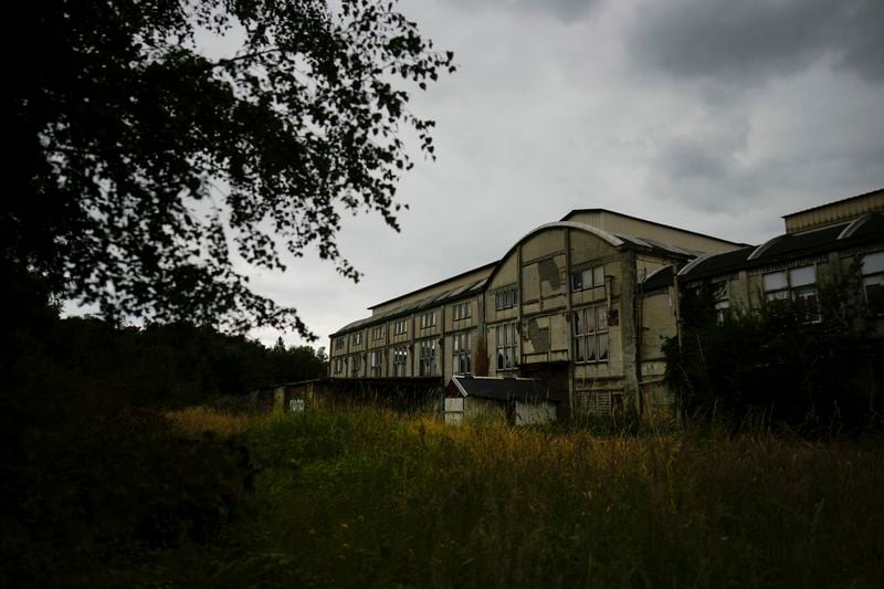 An abandoned pithead building is pictured in Henin-Beaumont, northern France, Sunday, June 30, 2024. A depressed former mining town is at the heart of French far-right leader Marine Le Pen's long-term political strategy. Her party's electoral success Sunday came as no surprise to the hundreds of fierce supporters who had gathered in the town of Henin-Beaumont to see her victory speech. (AP Photo/Thibault Camus)