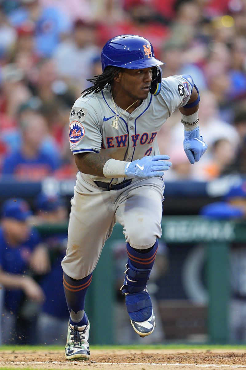 New York Mets' Luisangel Acuna runs after hitting single off Philadelphia Phillies' Carlos Estévez during the ninth inning of a baseball game, Saturday, Sept. 14, 2024, in Philadelphia. (AP Photo/Derik Hamilton)