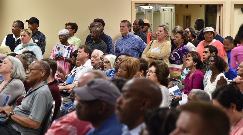 Hundreds of DeKalb County residents filled the Maloof Auditorium to a standing-room-only capacity Thursday night, seeking answers to high water bills. BRANT SANDERLIN/BSANDERLIN@AJC.COM