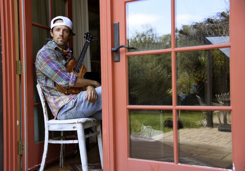 In this June 16, 2020 photo, singer-songwriter Jason Mraz poses for a portrait at his home in Oceanside, California. (AP Photo/Chris Pizzello)