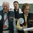 Former President Jimmy Carter (left) and his wife, Rosalynn, observe the 2006 Palestinian parliamentary elections as part of an 80-member delegation, organized by the Carter Center and the National Democratic Institute. (Courtesy of the Carter Center)