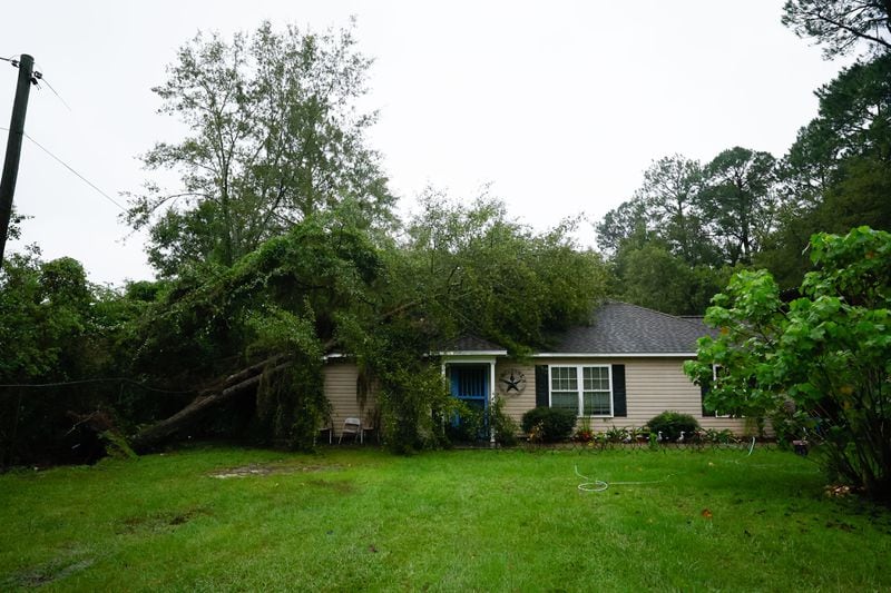 A tree is resting on a home’s roof in Homerville, Georgia, as part of the damage caused by Hurricane Debby, which passed through southern Georgia on Tuesday, August 6, 2024.
(Miguel Martinez / AJC)