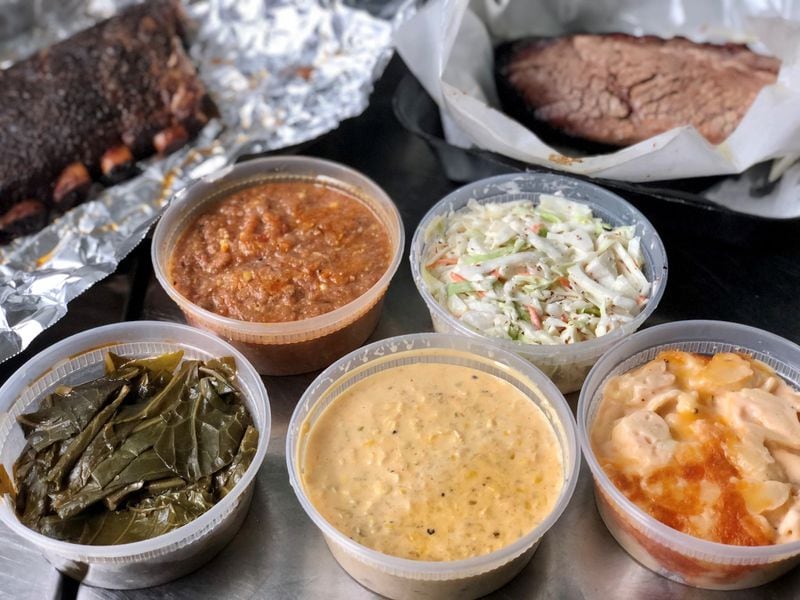Here, you see a half slab of ribs, a pound of brisket and every side currently on the menu at DAS BBQ on Collier Road. CONTRIBUTED BY WENDELL BROCK