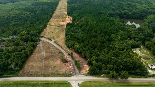 August 9, 2022 Atlanta - Aerial photograph shows the site of the proposed Atlanta public safety training center at the site of the old Atlanta prison farm in Atlanta on Tuesday, August 9 2022. Key Road shows in foreground. A growing number of southeast Atlanta neighborhoods are speaking out against the proposal to build a massive training center for police officers and firefighters on forested land in DeKalb County. (Hyosub Shin / Hyosub.Shin@ajc.com)