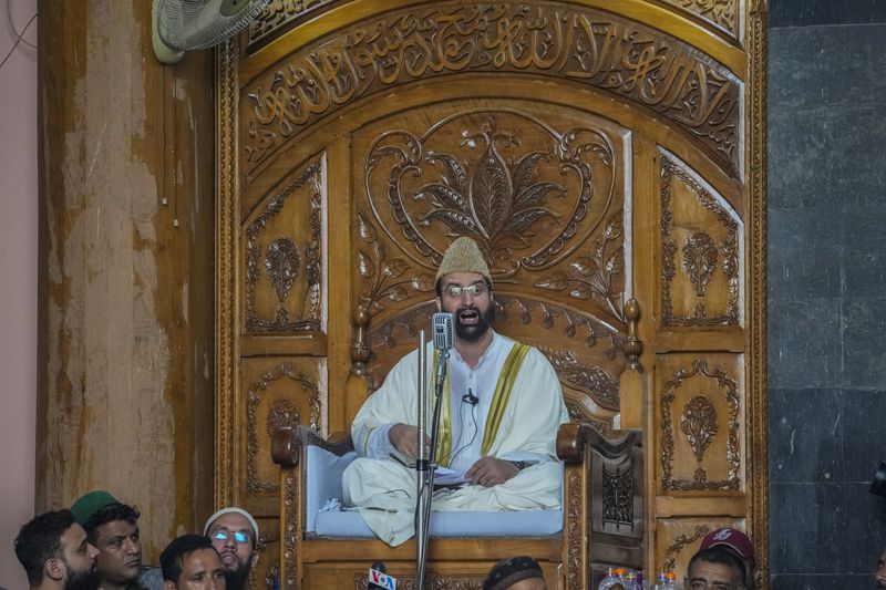 FILE- Top Kashmiri separatist leader Mirwaiz Umar Farooq delivers his speech inside the Jamia Masjid or Grand Mosque in Srinagar, Indian controlled Kashmir, Sept. 22, 2023. (AP Photo/Mukhtar Khan, File)