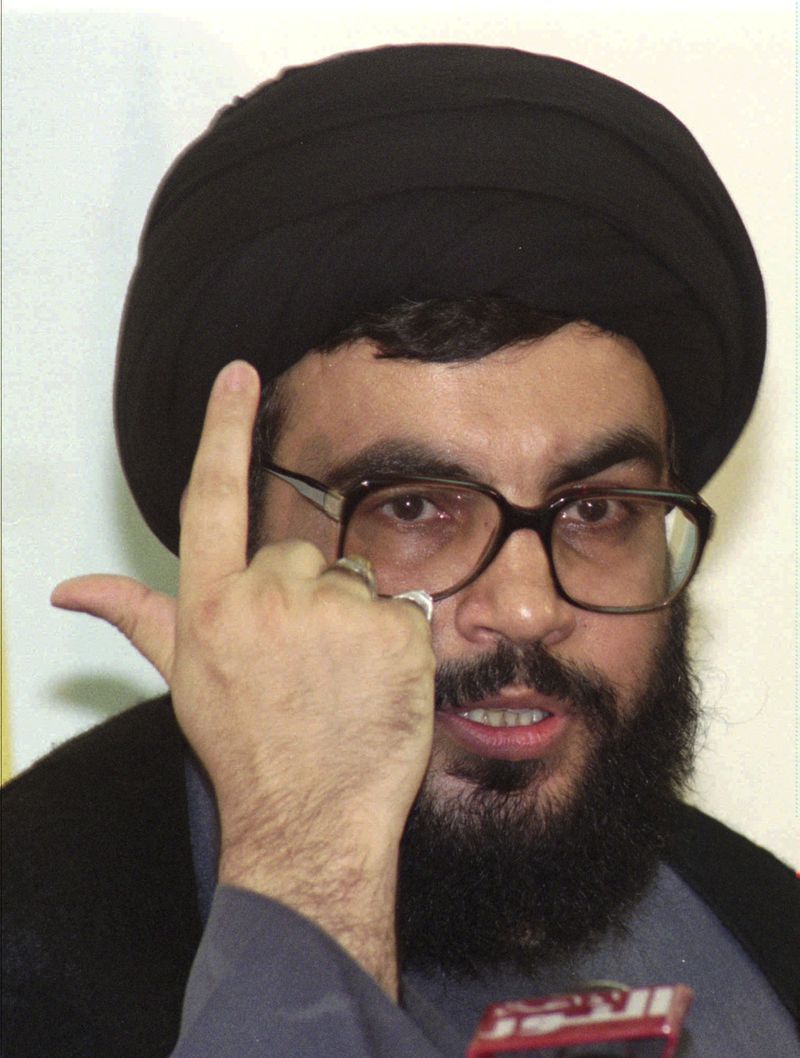 FILE - Hezbollah leader Hassan Nasrallah speaks at a Beirut news conference Monday, July 22, 1996. (AP Photo/Ahmed Azakir, File)