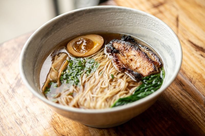 Truffle Chintan Ramen with light chicken and fish broth, pork chashu, soft boiled egg, spinach, bamboo shoots, chives, and thin noodles. Photo credit- Mia Yakel.