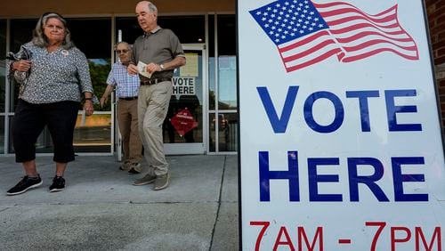 FILE - Voters depart an election center during primary voting, Tuesday, May 21, 2024, in Kennesaw, Ga. (AP Photo/Mike Stewart, File)