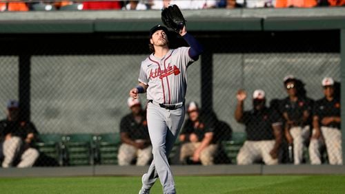 Atlanta Braves right fielder Brian Anderson makes a catch on a fly ball by Baltimore Orioles' Austin Hays during the second inning of a baseball game Wednesday, June 12, 2024, in Baltimore. (AP Photo/Nick Wass)