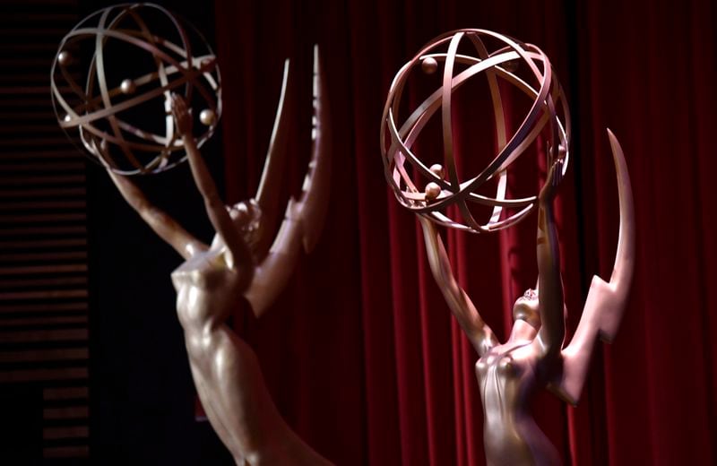 FILE - Emmy statues appear on stage at the 70th Primetime Emmy nominations announcement in Los Angeles on July 12, 2018. (Photo by Chris Pizzello/Invision/AP, File)