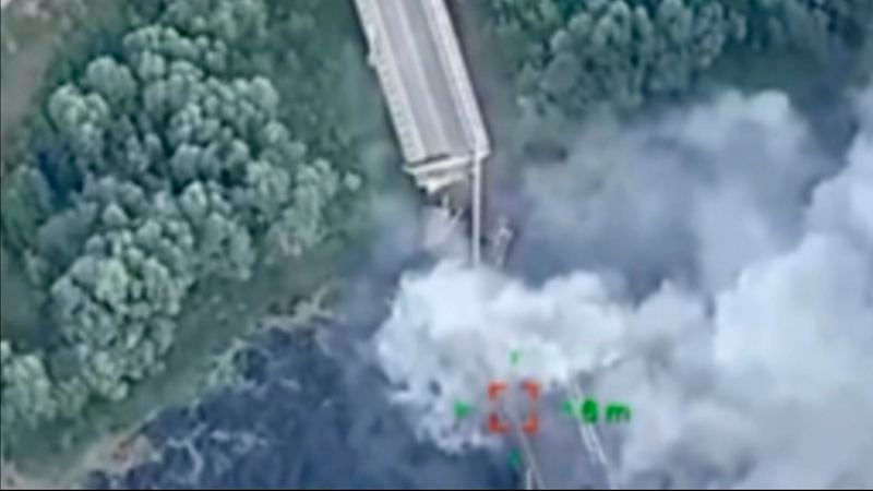 In this photo provided by the Ukrainian Defence Ministry Press Office, a strategically important bridge over the river Seym is destroyed by Ukrainian troops as they continue their incursion into the Kursk region, Russia, Friday, Aug. 16, 2024. The bridge was used by the Kremlin to supply its troops and its destruction could hamper their efforts. (Ukrainian Defence Ministry Press Office via AP)