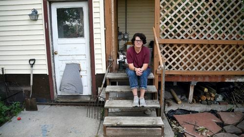 Becky Blackburn, one of the few Democrats in Niobrara County, poses for a portrait outside her home, July 30, 2024, in Lusk, Wyo. (AP Photo/Thomas Peipert)