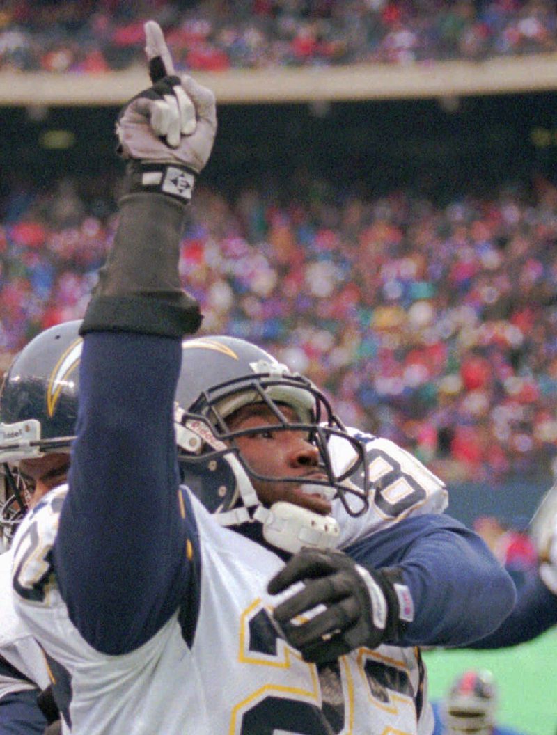 FILE - - San Diego Chargers running back Rodney Culver (22) celebrates after scoring the tying touch-down against the New York Giants Saturday December 23, 1995, in East Rutherford, N.J. Culver and his wife, Karen, were believed to be among the 109 people aboard an airliner that crashed after takeoff Saturday from Miami International Airport. (AP Photo/Bill Kostroun)