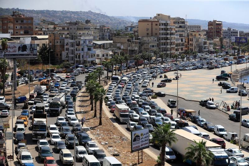 FILE - Cars sit in traffic as they flee the southern villages amid ongoing Israeli airstrikes, in Sidon, Lebanon, Monday, Sept. 23, 2024. (AP Photo/Mohammed Zaatari, File)