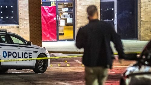 A man was found dead in the parking lot of the Indian Trail Court shopping plaza Wednesday morning. He was killed in a shooting, according to Gwinnett County police.