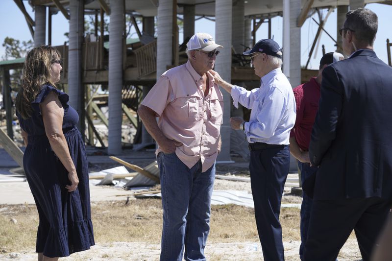 President Joe Biden greets people in Keaton Beach, Fla., Thursday, Oct. 3, 2024, during his tour of areas impacted by Hurricane Helene. (AP Photo/Susan Walsh)