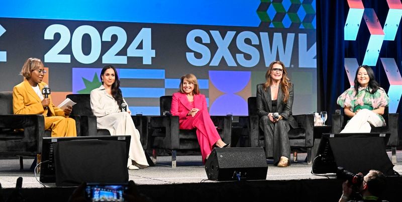 Errin Haines (left) is a guest today on the "Politically Georgia" show. She is pictured moderating a panel with (left to right) Meghan, Duchess of Sussex, Katie Couric, Brooke Shields and Nancy Wang Yuen in Austin, Texas, in March. 