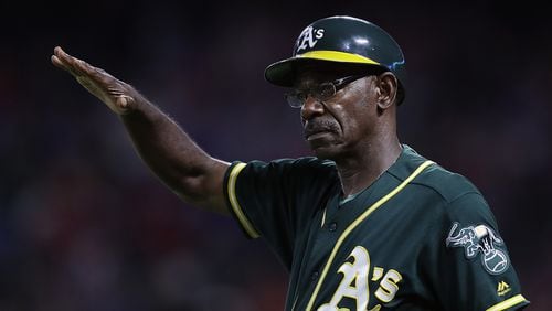 Ron Washington has served as the Oakland Athletics' third base coach since 2015. He was the manager of the Texas Rangers when the went to the World Series in 2010 and 2011.