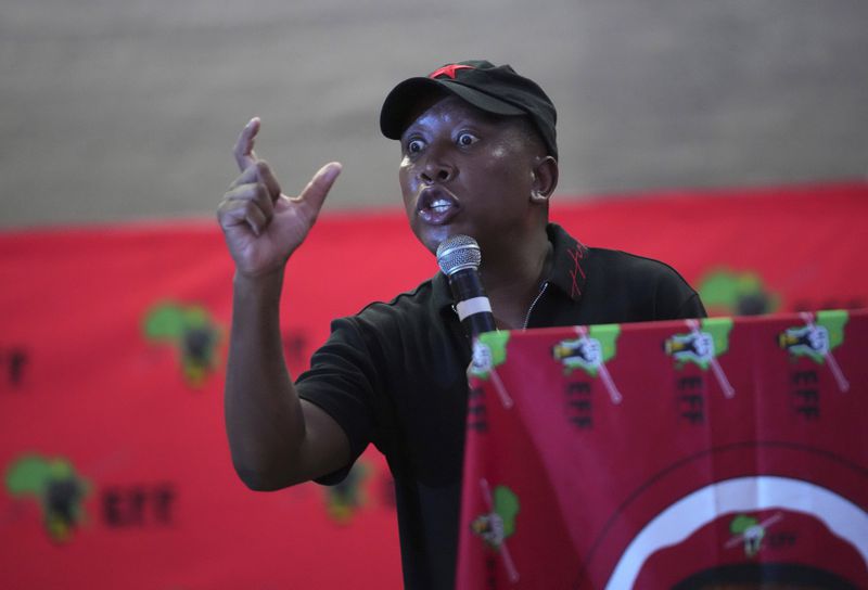 FILE — Opposition Economic Freedom Fighters (EFF) leader Julius Malema addresses supporters and volunteers ahead of the party's manifesto launch near Durban, South Africa, Thursday, Feb. 8. 2024. Several polls have the African National Congress' support below 50% ahead of next Wednesday's, May 29, 2024 vote, raising the prospect that it might not be the majority party for the first time since Nelson Mandela led it to victory in the first all-race elections that ended white minority rule in 1994.(AP Photo/Tsvangirayi Mukwazhi, File)