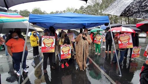 Supporters of the South DeKalb YMCA gather during a rally decrying its temporary closure on Thursday, March 31, 2021. SPECIAL PHOTO