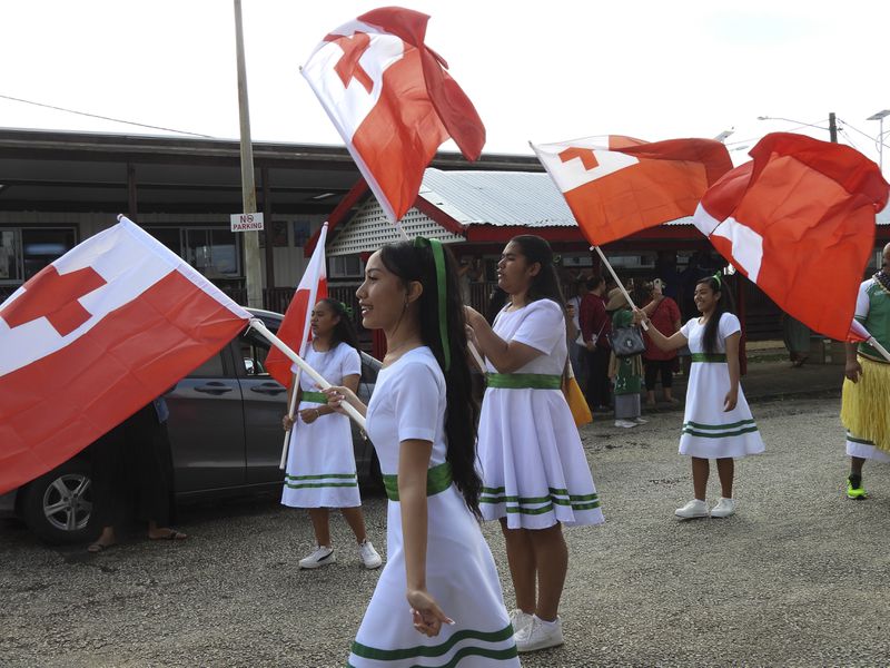 High school students march for climate justice as Pacific leaders meet in Nuku'alofa, Tonga, Tuesday, Aug. 27, 2024. (AP Photo/Charlotte Graham-McLay)