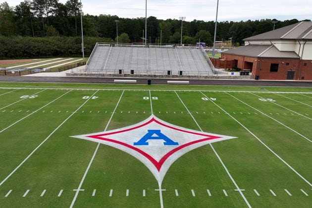 A big “A” logo has been painted on 50-yard line for a tribute to Apalachee High School ahead of Jefferson High School’s home football game against Stephens County at Jefferson Memorial Stadium, Friday, September 6, 2024, in Jefferson. (Hyosub Shin / AJC)