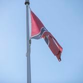 10/6/2020 - Stone Mountain, Georgia - A confederate flag waves on a pole at the flag terrace at the Stone Mountain walk-up trail in Stone Mountain, Tuesday, October 6, 2020. (Alyssa Pointer / Alyssa.Pointer@ajc.com)