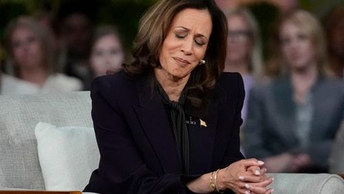 Democratic presidential nominee Vice President Kamala Harris listens to a parent's survivor story as she joins Oprah Winfrey at Oprah's Unite for America Live Streaming event Thursday, Sept. 19, 2024 in Farmington Hills, Mich. (AP Photo/Paul Sancya)