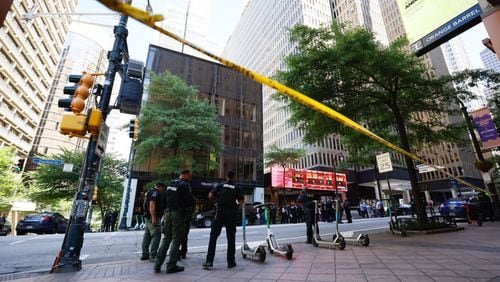 Four people were injured Tuesday afternoon during a shooting in a busy downtown Atlanta food court, police said. MIGUEL MARTINEZ / AJC