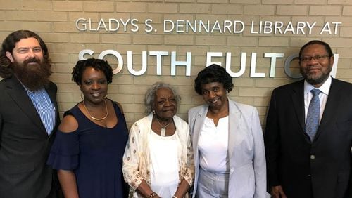 Library officials and relatives of Gladys Dennard remembered her at a renaming ceremony. FULTON COUNTY