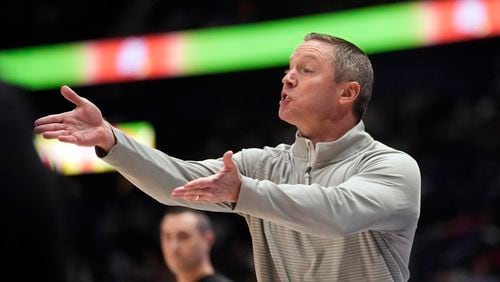 Georgia head coach Mike White reacts on the sideline during the first half of an NCAA college basketball game against Missouri at the Sotheastern Conference tournament Wednesday, March 13, 2024, in Nashville, Tenn. (AP Photo/John Bazemore)