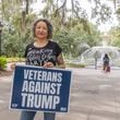 Air Force vet Tabatha Strozier of Savannah said she had a hard time choosing which campaign sign to order for her yard. One option was “Veterans For Biden.” Another was “Veterans Against Trump.” Then President Joe Biden ended his campaign. “Now, with Kamala Harris as the nominee instead of Biden," she said, "I’m really glad I went anti-Trump.” (AJC Photo/Katelyn Myrick)