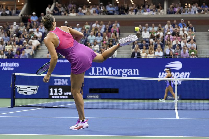 Aryna Sabalenka, of Belarus, kicks the ball after double faulting Jessica Pegula, of the United States, during the women's singles final of the U.S. Open tennis championships, Saturday, Sept. 7, 2024, in New York. (AP Photo/Seth Wenig)