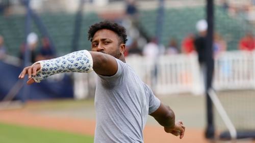 Braves second baseman Ozzie Albies attempts a throw as he is seen with a cast on his left hand on Thursday, Aug. 1, 2024. Albies, who broke his wrist, remains on the injury list and is expected to miss around two months.
(Miguel Martinez/ AJC)