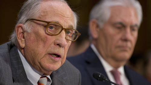 Secretary of State-designate Rex Tillerson listens as right as former Georgia senator Sam Nunn introduces him on Capitol Hill in January. AP/Steve Helber