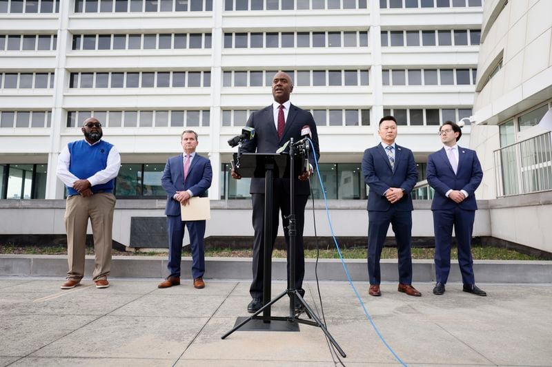  U.S. Attorney Ryan K. Buchanan (center) speaks during a press conference announcing the indictments charging twenty-three gang members and associates with racketing conspiracy, drug trafficking, and firearms violations on Monday, Nov. 13, 2023.
Miguel Martinez /miguel.martinezjimenez@ajc.com